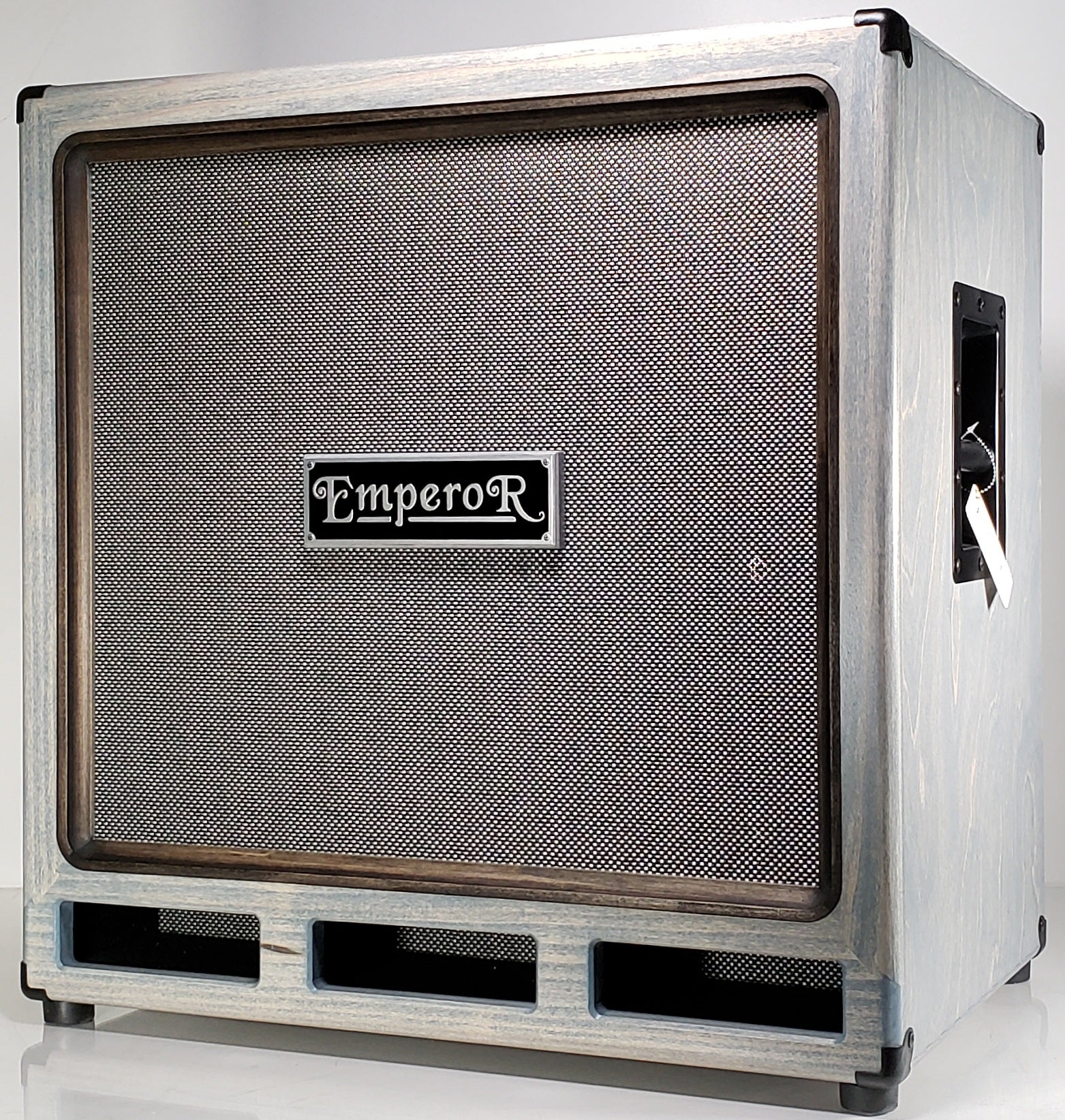 a gray 4x10 bass speaker cabinet