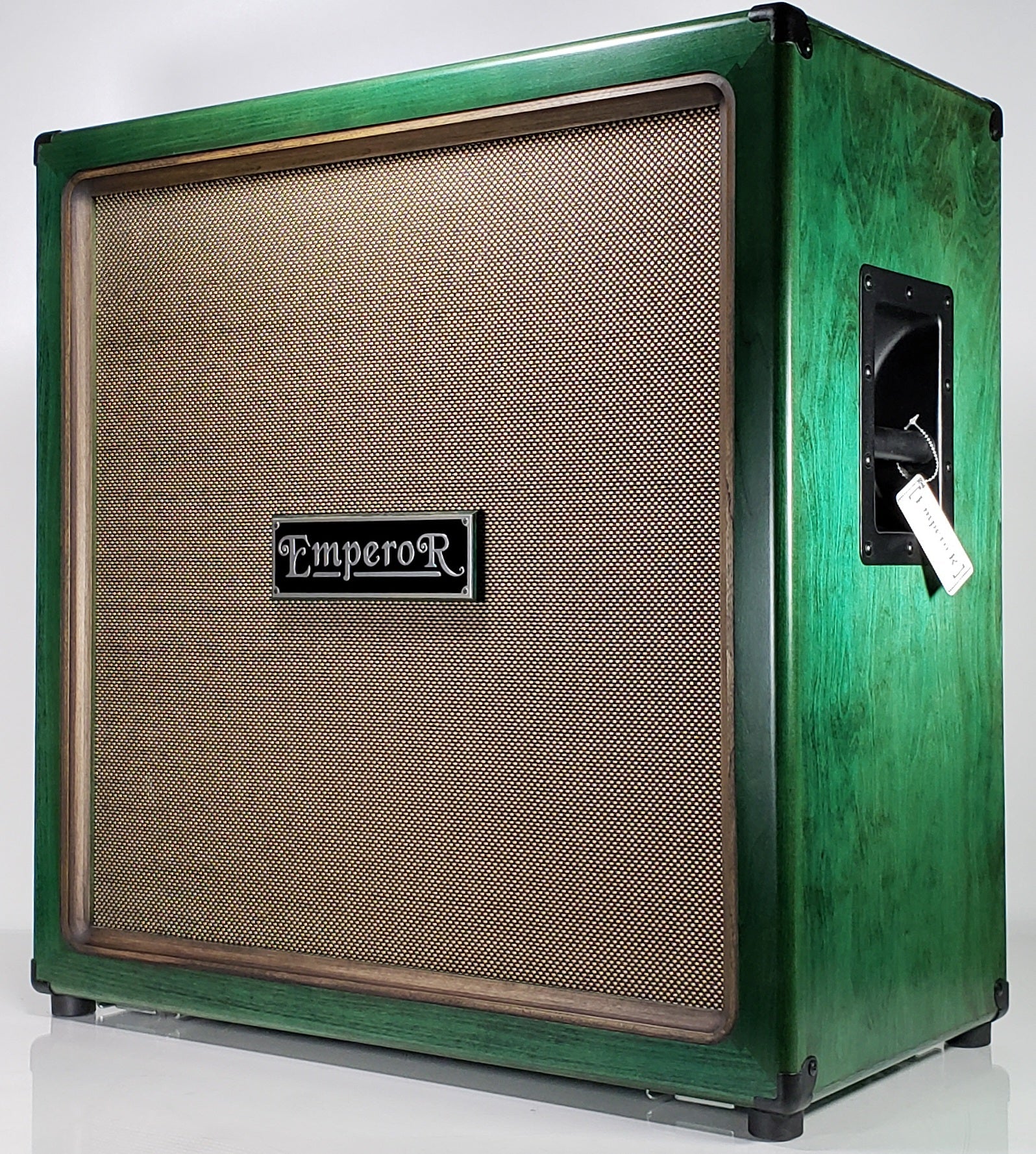 a green oversized 4x12 guitar speaker cabinet