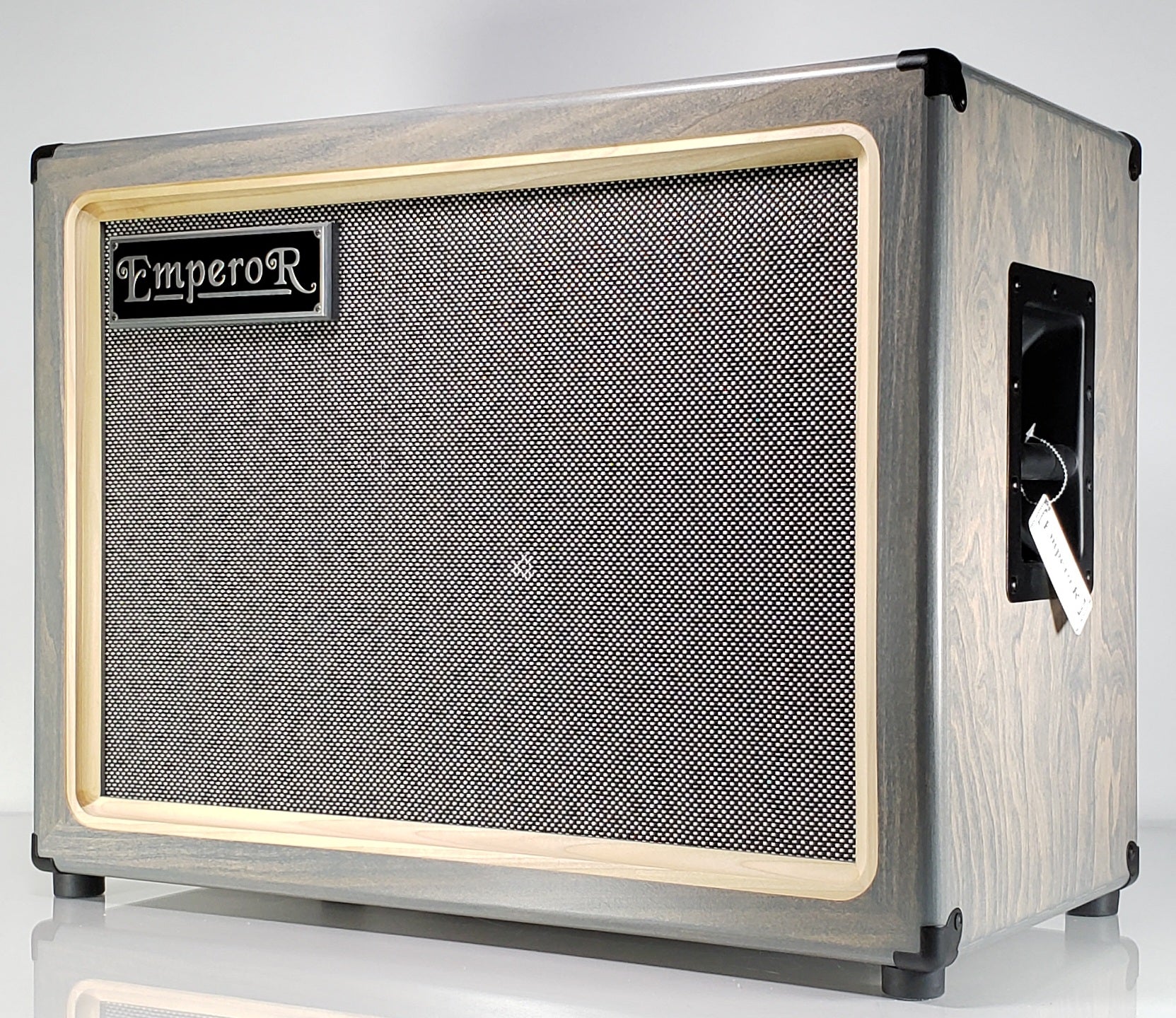 a gray 2x12 guitar speaker cabinet