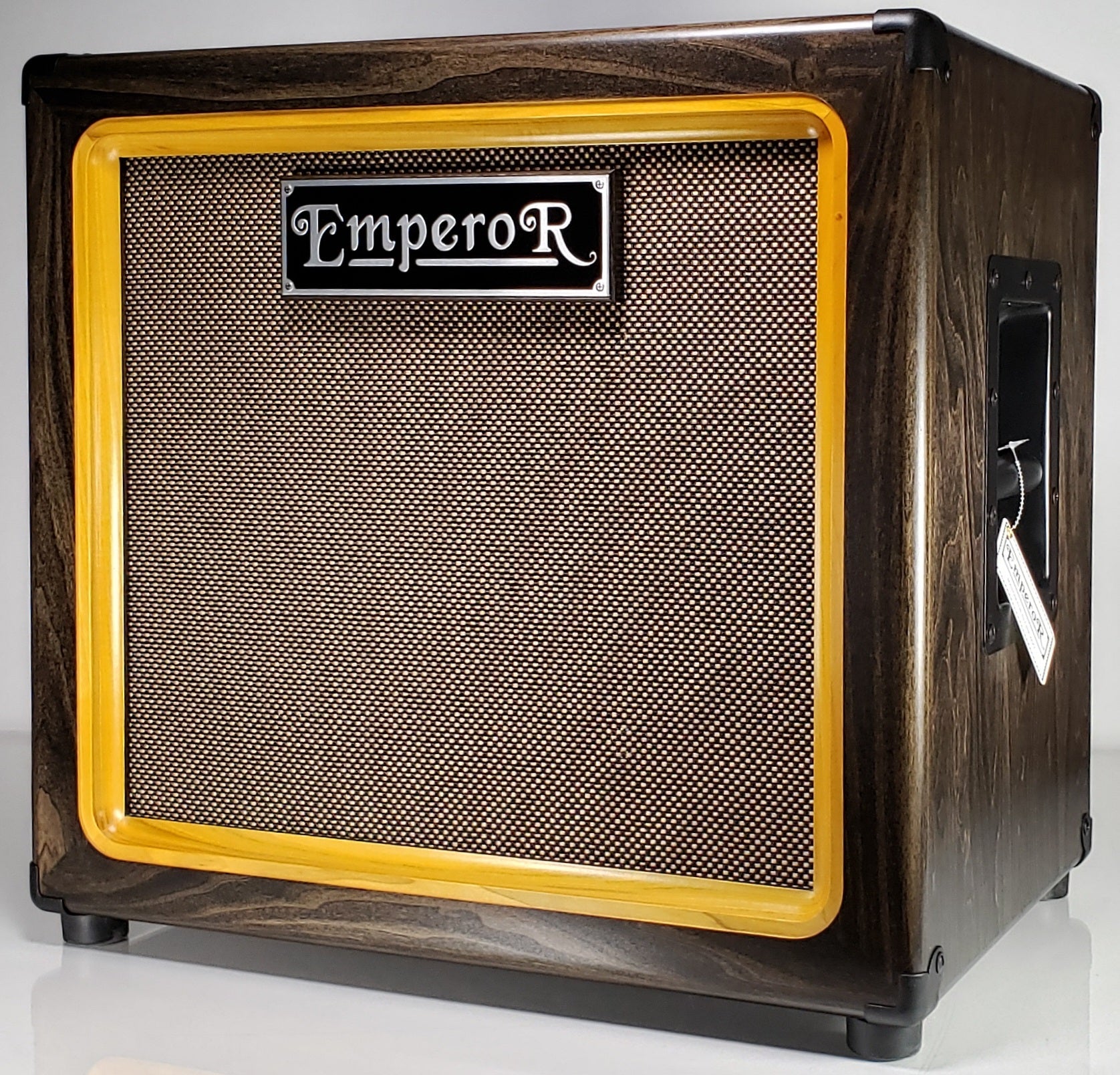 a 1x12 guitar speaker cabinet with a white background