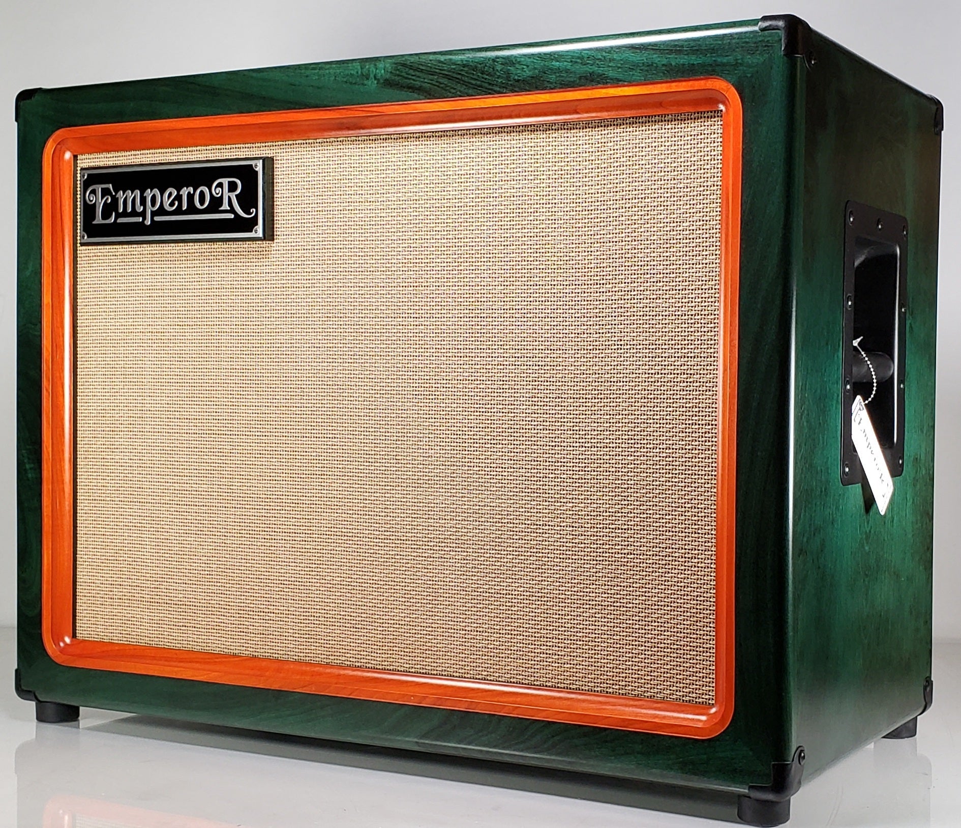 a green and orange 2x12 guitar speaker cabniet