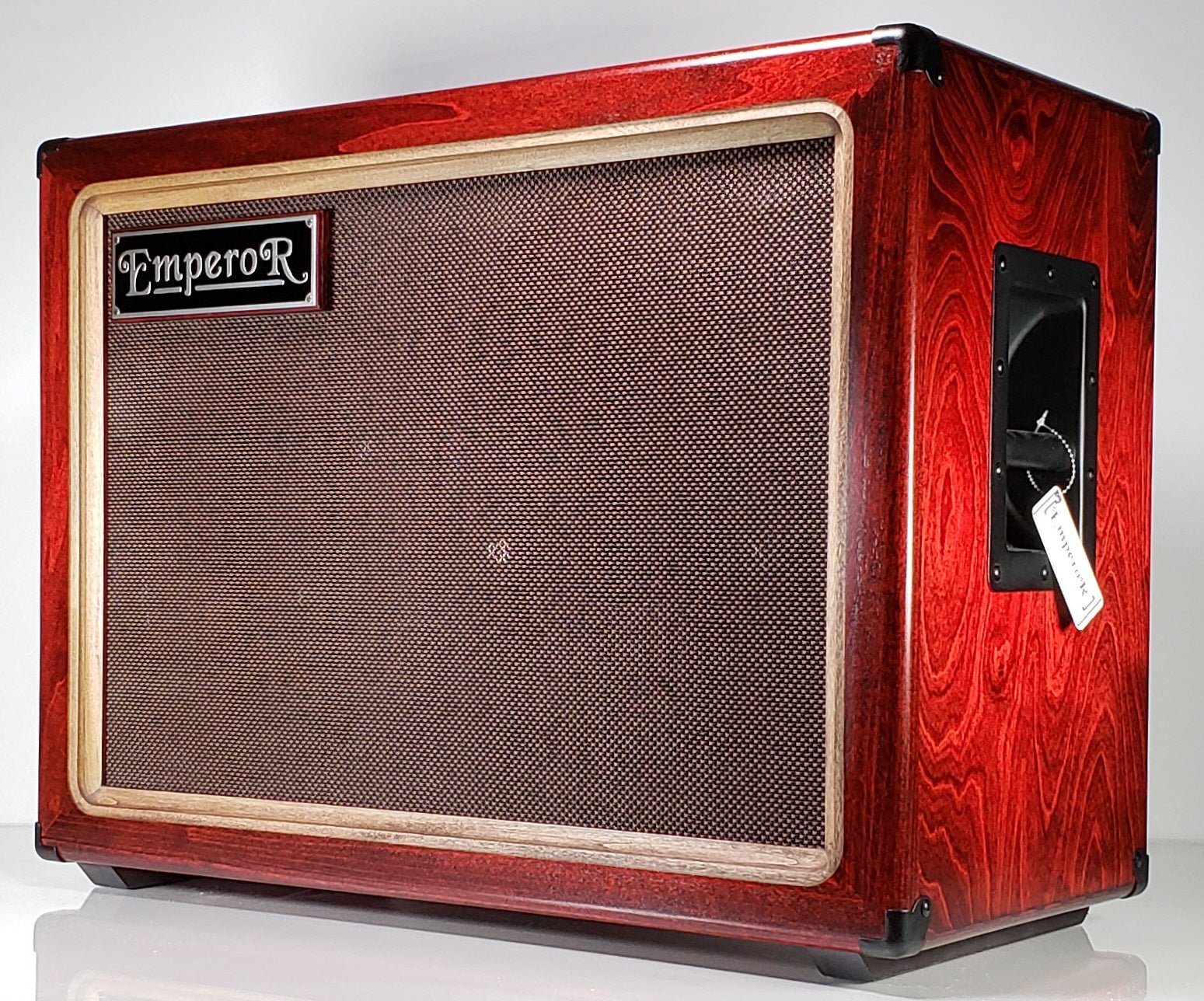 a red 2x12 guitar speaker cabinet