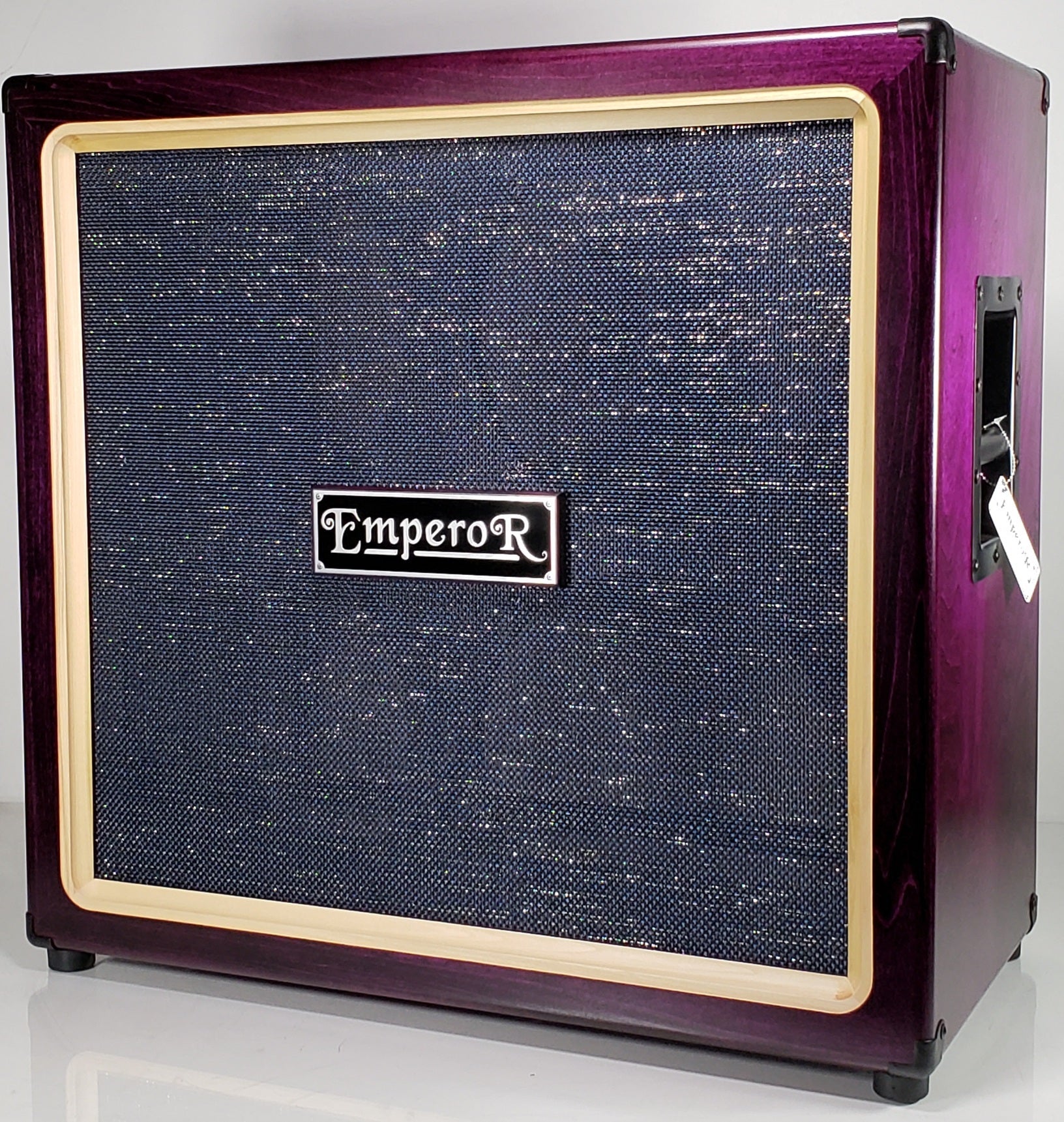 a 4x12 guitar speaker cabinet with a blue grille