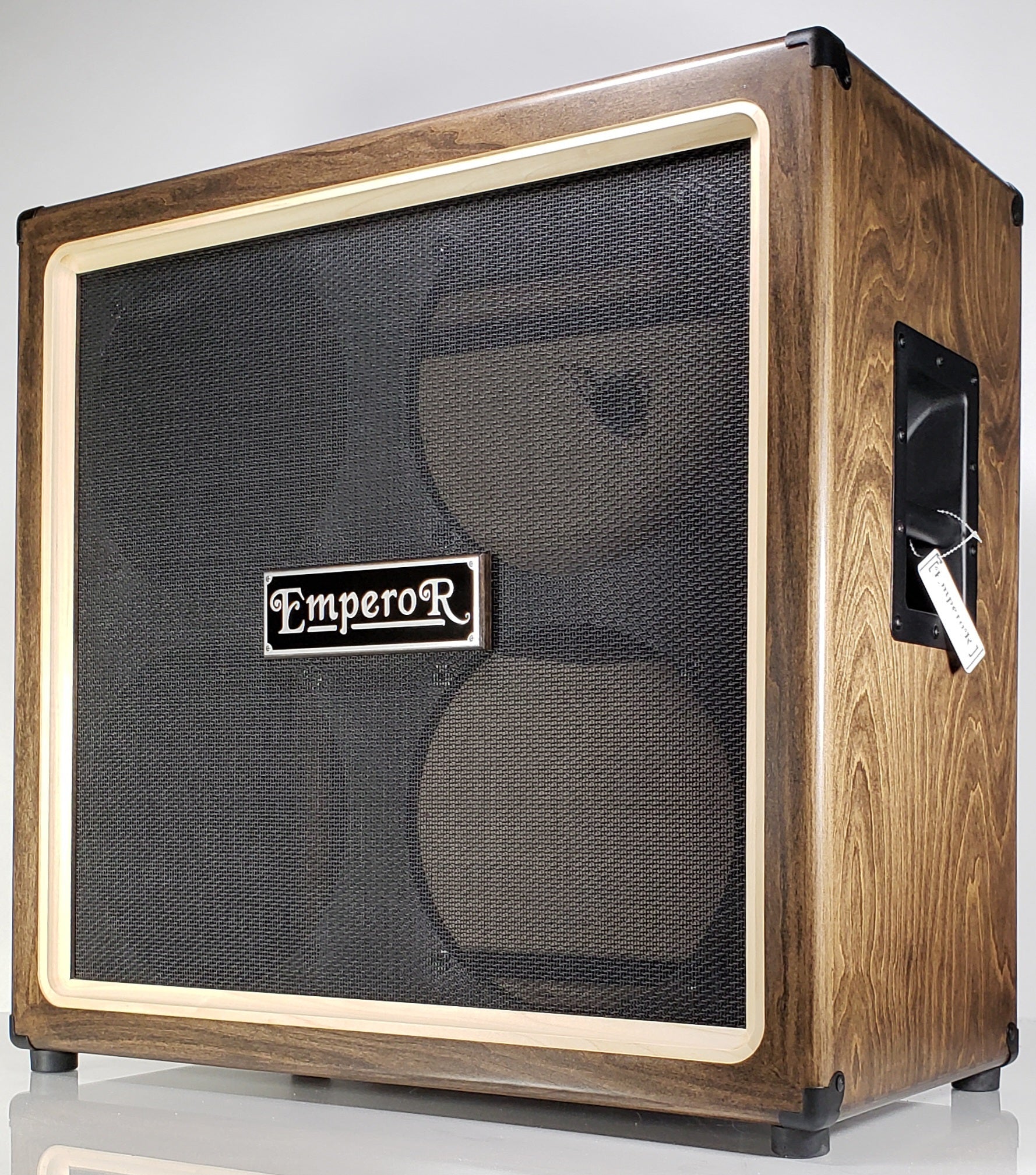 a 4x12 guitar speaker cabinet with a black grille