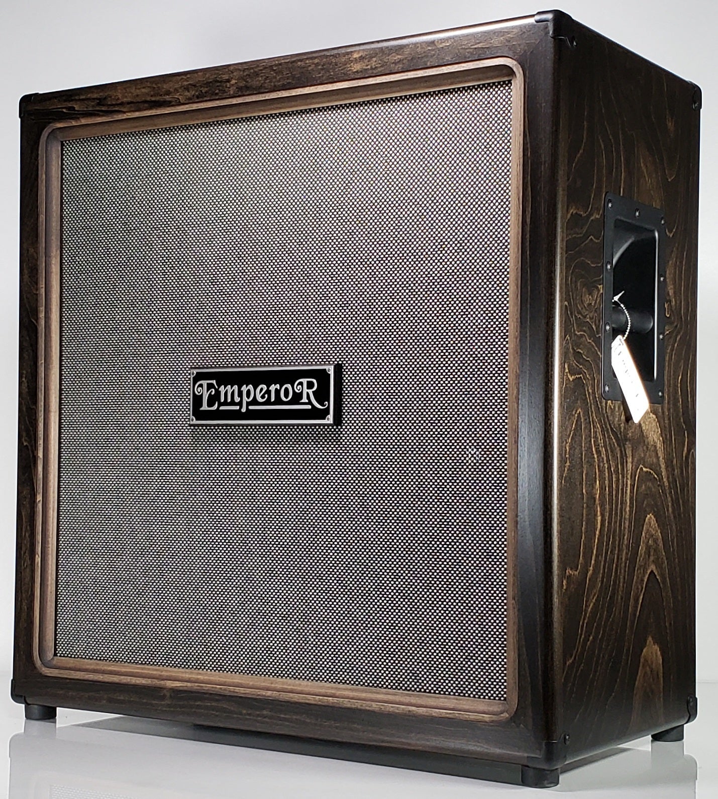 an oversized 4x12 guitar speaker cabinet with a dark stain