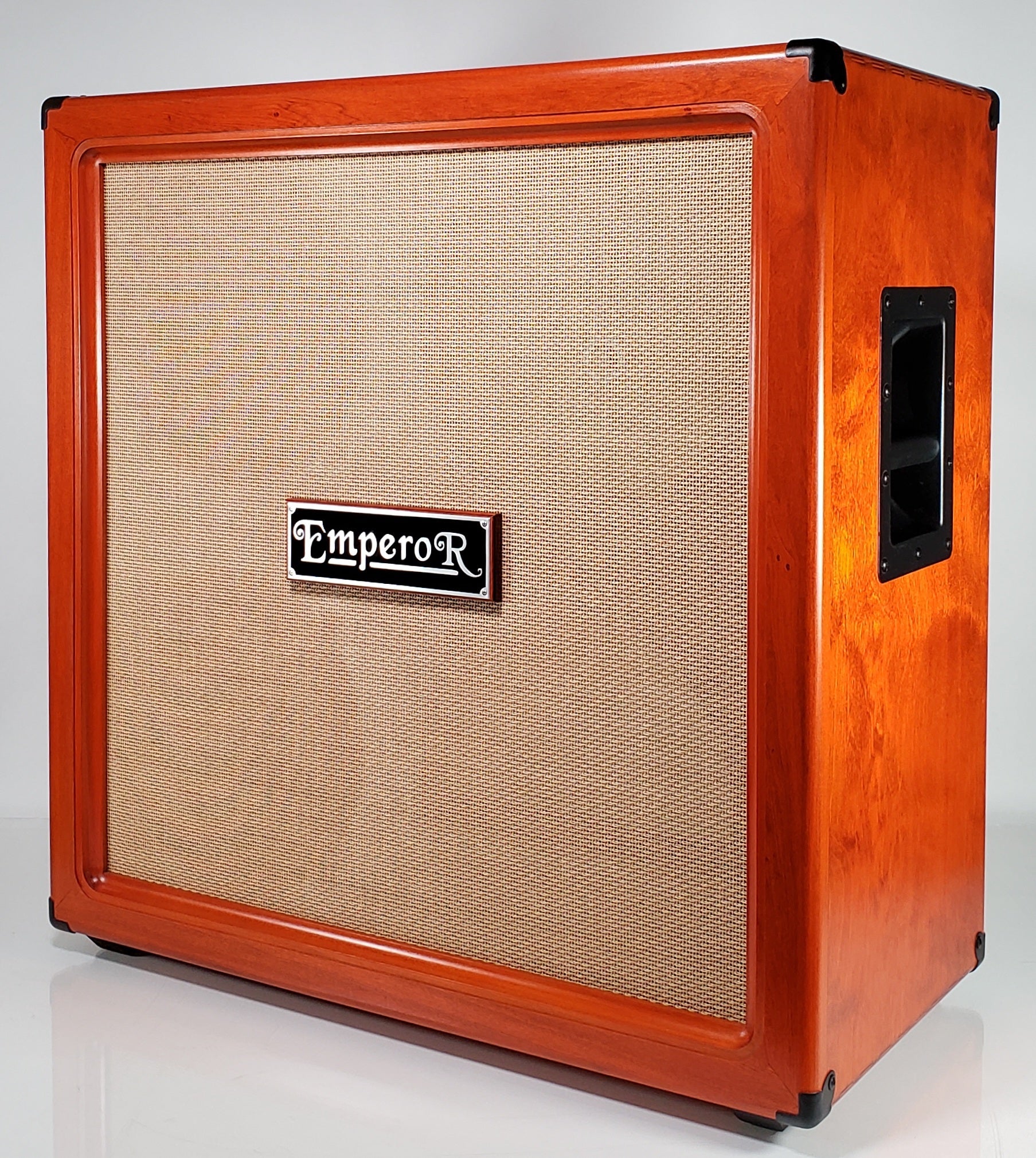 an orange oversized 4x12 guitar speaker cabinet