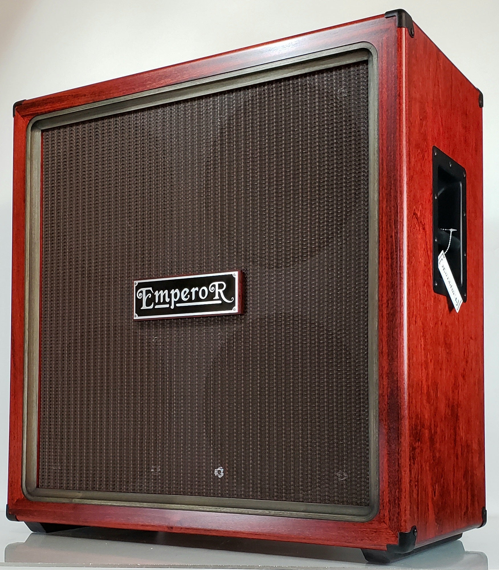 a red oversized 4x12 guitar speaker cabinet