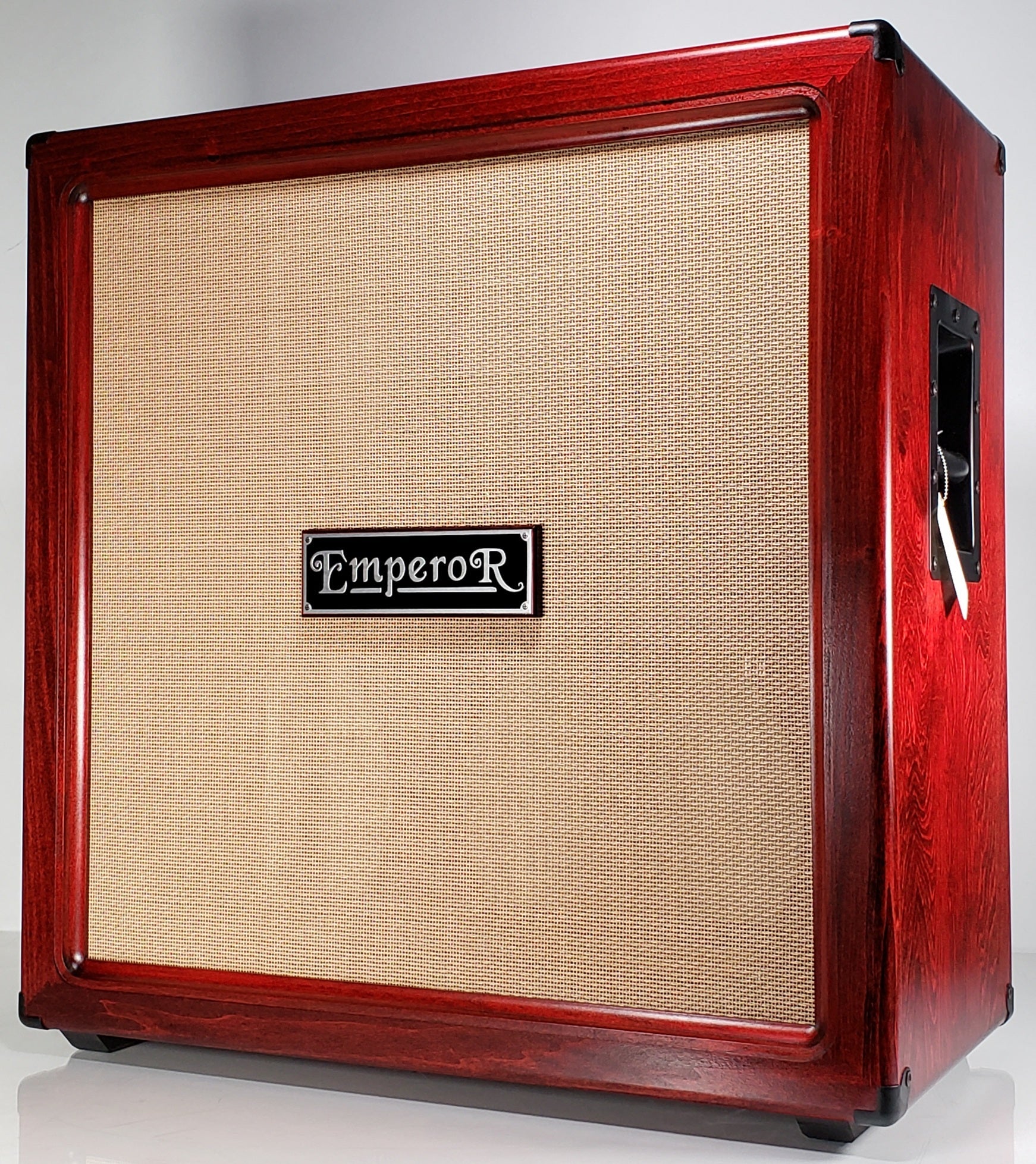 a red oversized 4x12 guitar speaker cabinet