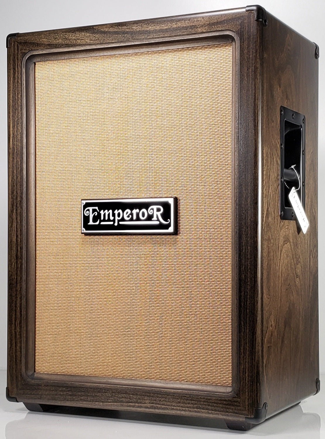 a vertical 2x12 guitar speaker cabinet with a dark stain