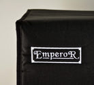 black padded cover for speaker cabinet with white embroidered company logo